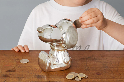 Японцам предложили хранить деньги в серебряном Снупи